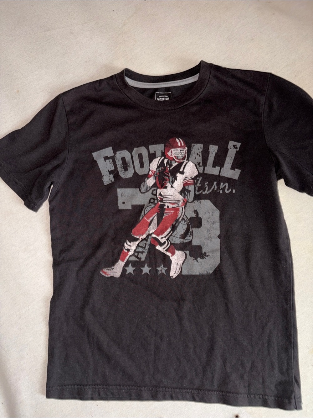 Kids Size 8/10 Mossimo Black Football Graphic Tee with Red Accent